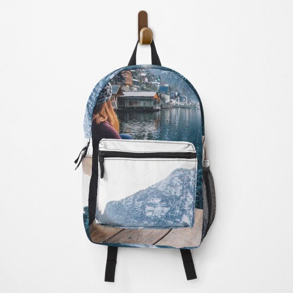 Item preview, girl sitting in front of a blue lake and mountain view designed and sold by DOKU_TEAM SHIRT.