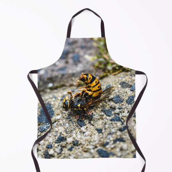 Item preview, A Bright Yellow and Black dead European wasp being eaten by ants on a sandy concrete ground designed and sold by James-Cole.