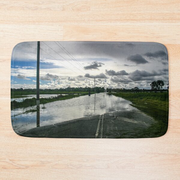 Item preview, A cloudy sky reflecting in the flood waters across Heatherton Road highway in Dandenong designed and sold by James-Cole.