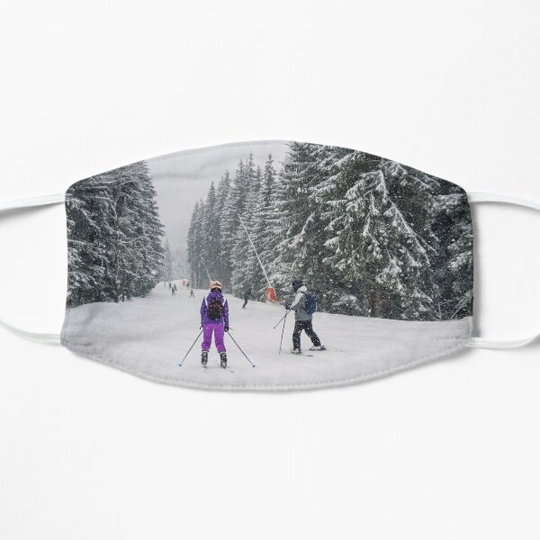 People skiing on the snowy slope Flat Mask