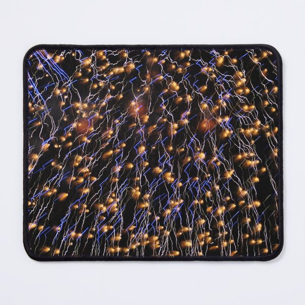 Closeup of an exploding firework filling the night sky. Mouse Pad