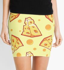 Pattern with a slice of cheese on a light yellow background Mini Skirt