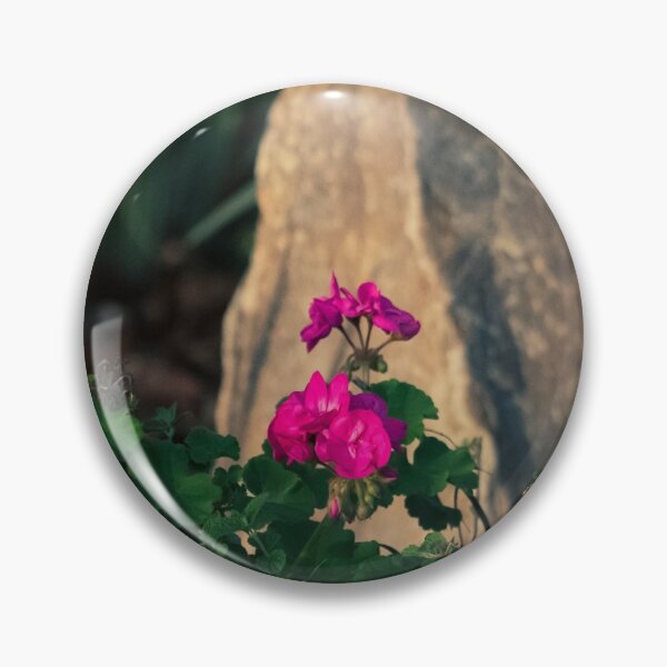 Item preview, Flowers Bright Pink Flower In Front Of A Rock designed and sold by Jason Gilbert.
