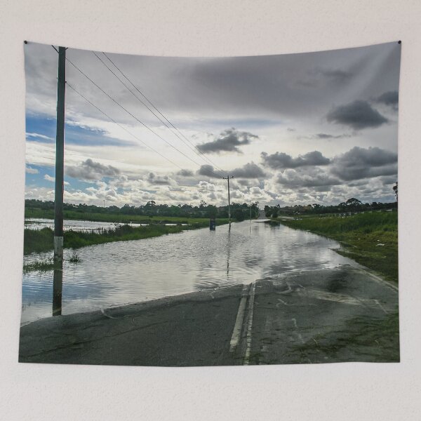 Item preview, A cloudy sky reflecting in the flood waters across Heatherton Road highway in Dandenong designed and sold by James-Cole.