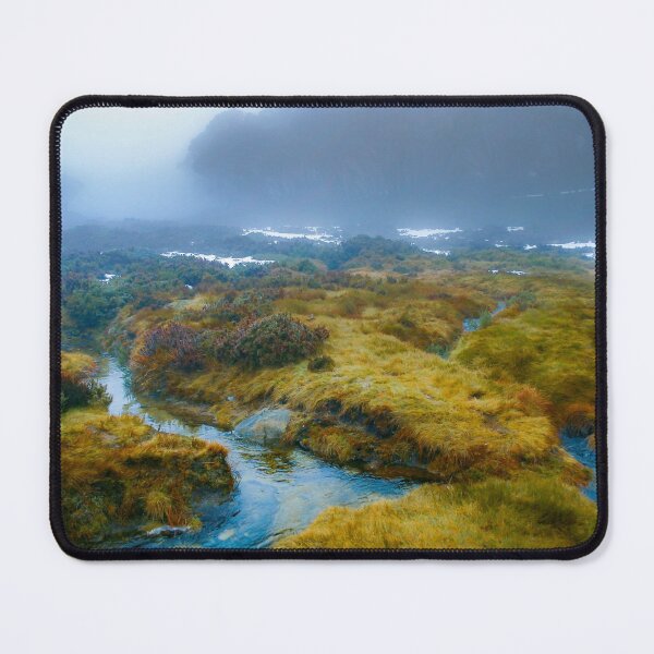 Item preview, Alpine streams cutting through a foggy landscape of grass and snow designed and sold by James-Cole.