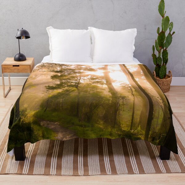 Item preview, Godrays from the golden sunrise shine through the misty forest trees designed and sold by James-Cole.