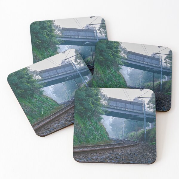 Item preview, Lonely train tracks disappearing under a bridge and into a foggy morning landscape designed and sold by James-Cole.