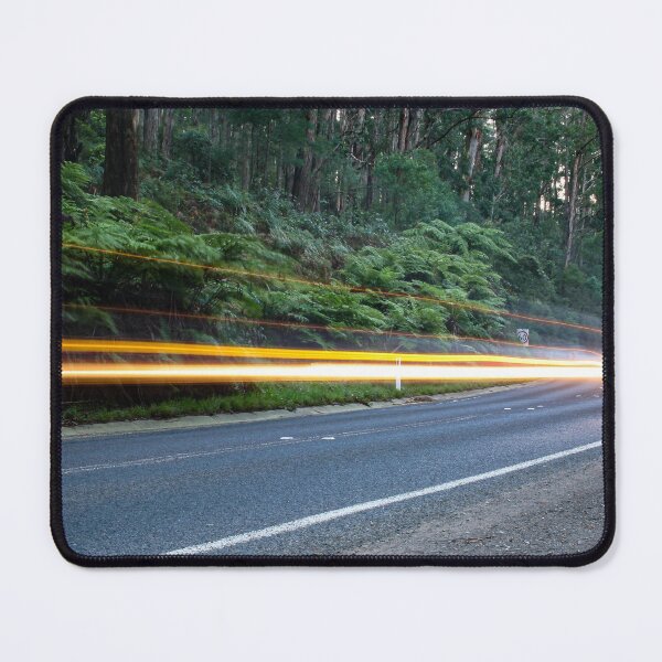 Item preview, Car lights streaking past on a quiet country road in the Australian rainforest designed and sold by James-Cole.