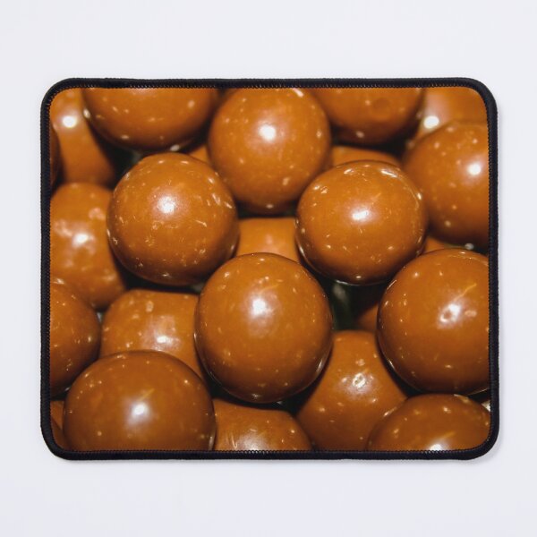 Item preview, Maltesers madness - Close-up of a bowl full of delicious chocolate honeycomb malt balls designed and sold by James-Cole.