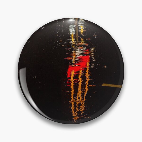 Item preview, Distorted reflection of a McDonalds sign in puddles at night designed and sold by James-Cole.