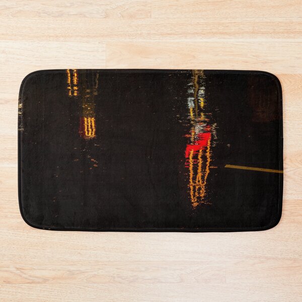 Item preview, Distorted reflection of a McDonalds sign in puddles at night designed and sold by James-Cole.