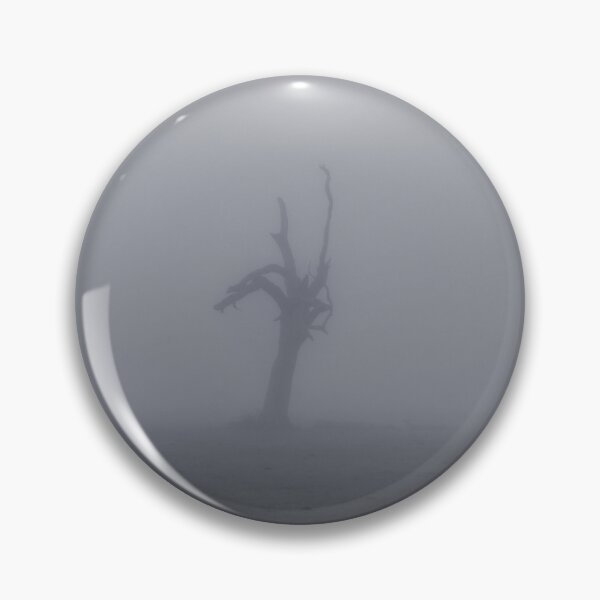 Item preview, Creepy silhouette of dead tree stump stands alone in a foggy field designed and sold by James-Cole.