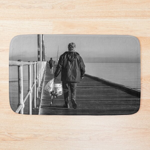 Item preview, Fisherman walking along a wooden pier on a calm sea with fishing rods and bucket in Frankston Victoria Australia Black and white designed and sold by James-Cole.