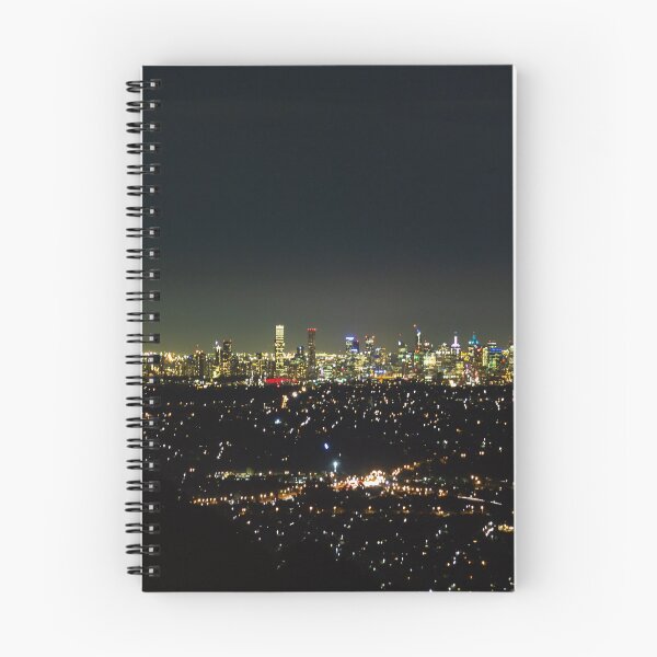 Item preview, Aerial shot of glowing lights of Melbourne City and suburban sprawl at night designed and sold by James-Cole.