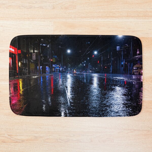 Item preview, An empty rainy city street at night with lights reflecting in puddles in Melbourne designed and sold by James-Cole.