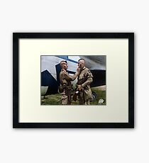 Filthy Thirteen member Clarence Ware applies war paint to Charles Plaudo. England, 31 December 1943. Framed Print