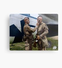 Filthy Thirteen member Clarence Ware applies war paint to Charles Plaudo. England, 31 December 1943. Metal Print