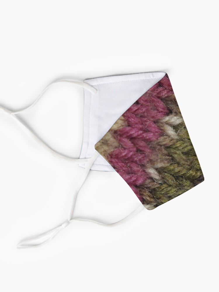 Alternate view of Knitted wool fabric texture with warm colours. Mask