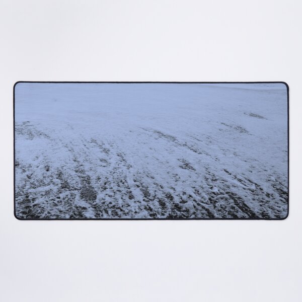 Frosty water on the beach Desk Mat
