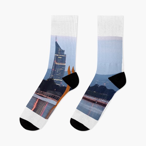 Item preview, Pedestrian bridge and skyscraper on Danube river at night in Vienna designed and sold by goceris.