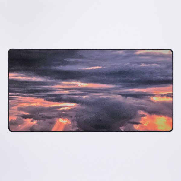 Mother nature loses her temper as Sun trys to shine. Desk Mat