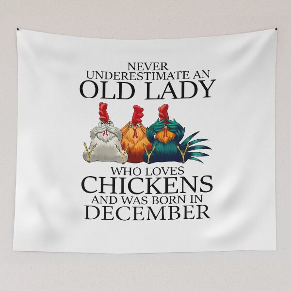 Item preview, NEVER UNDERESTIMATE AN OLD LADY WHO LOVES CHICKENS AND WAS BORN IN DECEMBER SHIRT1 designed and sold by JARELYSHOP.