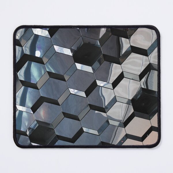 Glass blocks cover a ceiling and reflect distorted images. Look like Leggo blocks. Mouse Pad