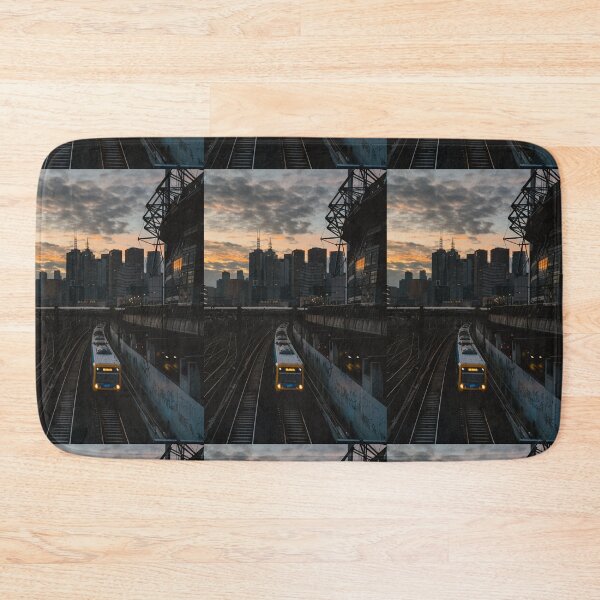 Item preview, Melbourne City Skyline and Train at Sunset  designed and sold by JonesyDave.