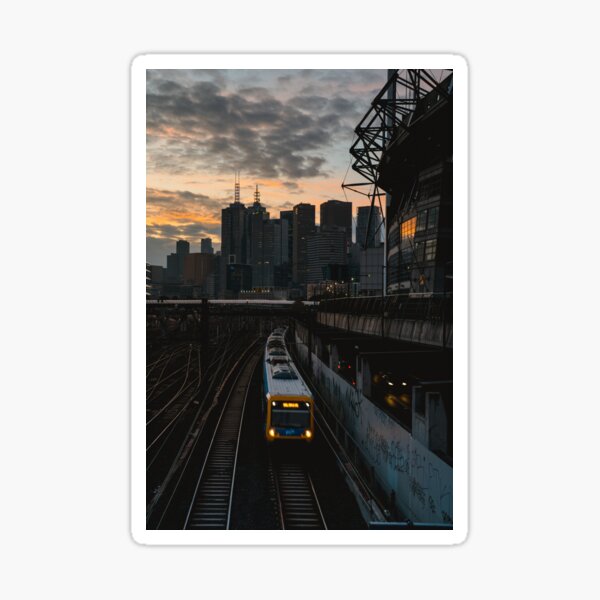 Item preview, Melbourne City Skyline and Train at Sunset  designed and sold by JonesyDave.