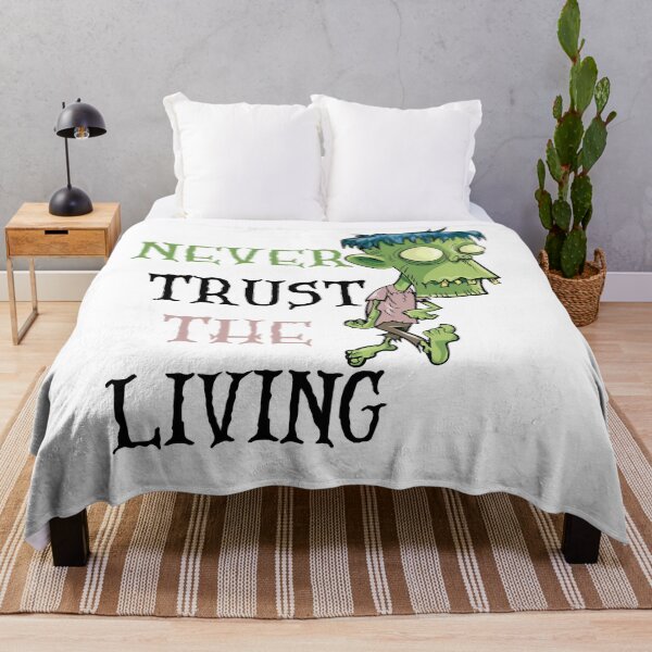 Item preview, Never Trust The Living , Halloween Gifts T-shirt  Essential T-Shirt designed and sold by Fado Store.