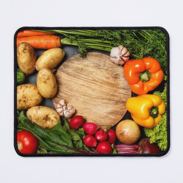 Item preview, Frame made of fresh assorted vegetables around wooden round cutting board close up designed and sold by dariazu.