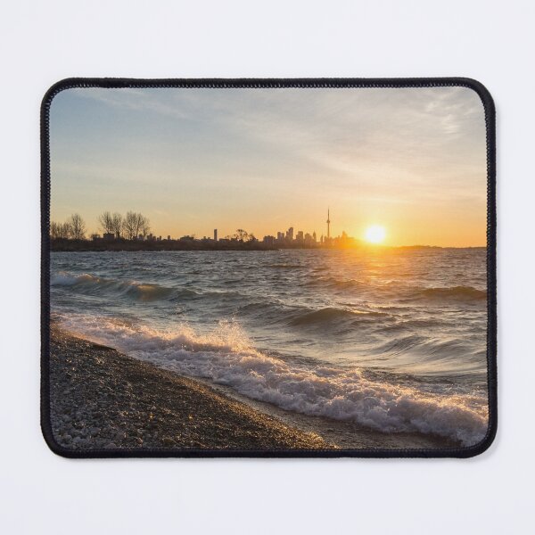 Item preview, Wave Splash Sunrise - Toronto Skyline Behind Rough Lake Ontario designed and sold by Georgia Mizuleva.