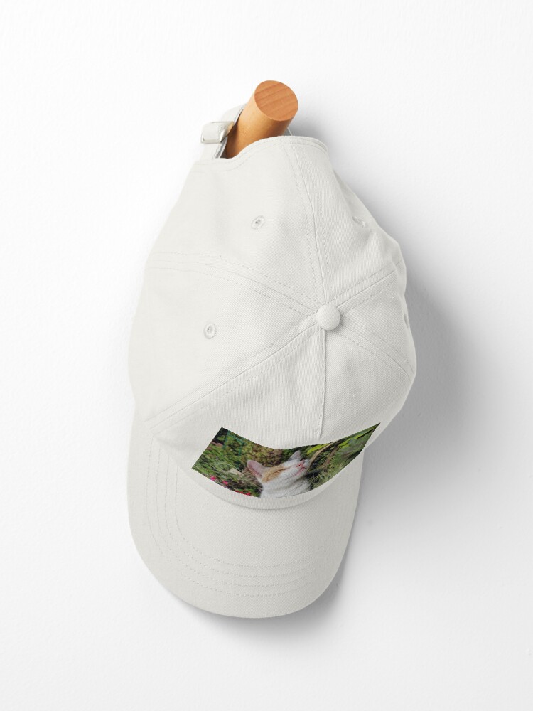 Alternative Ansicht von Glückskatze im Garten Cap