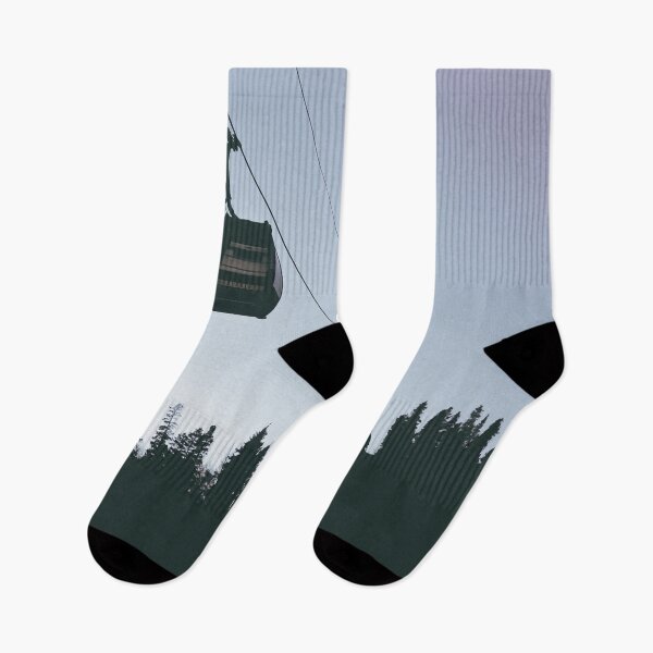 Item preview, Gondola ski lift at dusk above silhouetted tree line designed and sold by ErikBPhoto.