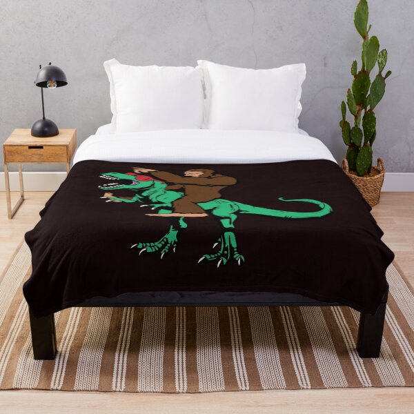 Item preview, big foot riding dinosaur shirt designed and sold by SukanyaShop.