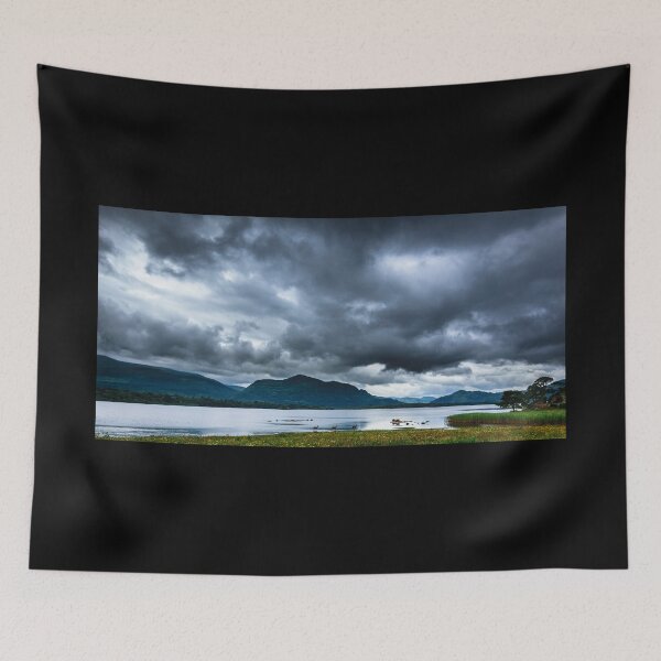 Item preview, Deer in a lake with mountains and stormy skies in Killarney National Park, Ring of Kerry near town of Killarney, County Kerry in Ireland designed and sold by AlbertMi.