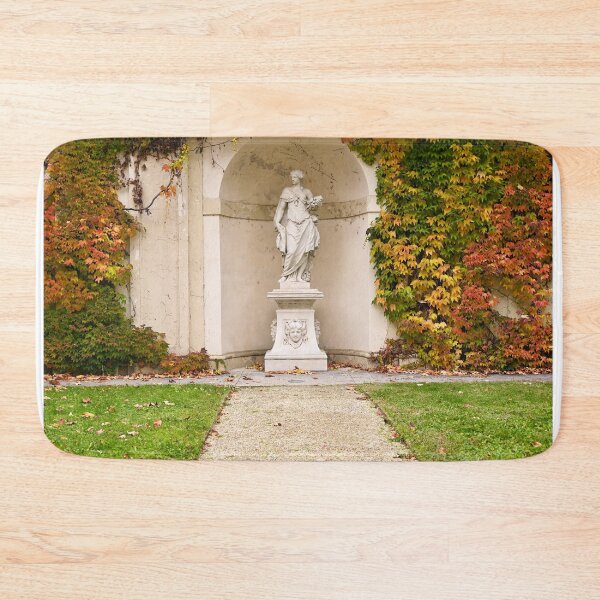 Item preview, statue and wall with creeper plant in Vienna autumn season designed and sold by goceris.