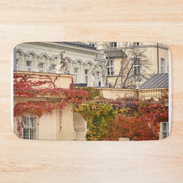 Item preview, old buildings covered with creeper colorful leaves in Vienna  designed and sold by goceris.
