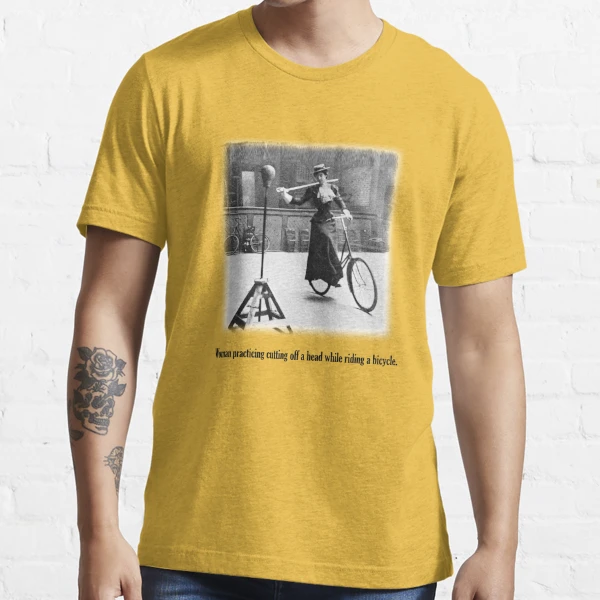 Woman practicing cutting off a head while riding a bicycle. | Essential  T-Shirt