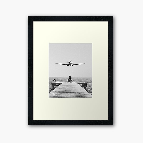 Steady As She Goes; aircraft coming in for an island landing black and white photography- photographs Framed Art Print