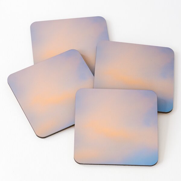 Item preview, Fluffy pinky orange clouds against a blue sky at sunset designed and sold by James-Cole.