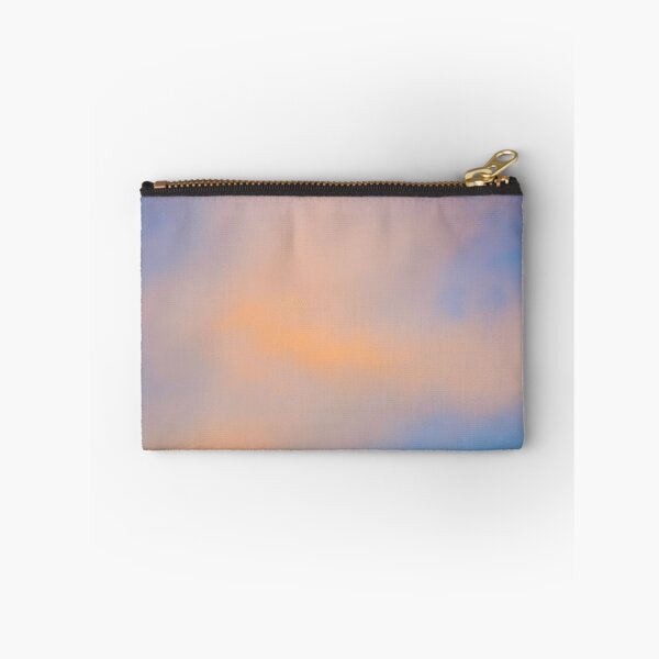 Item preview, Fluffy pinky orange clouds against a blue sky at sunset designed and sold by James-Cole.