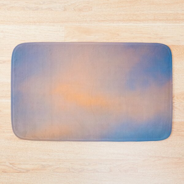Item preview, Fluffy pinky orange clouds against a blue sky at sunset designed and sold by James-Cole.