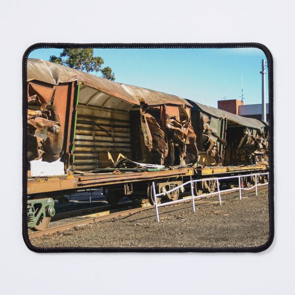 Item preview, Train cargo and goods carriages ripped open and rusting in the aftermath of a train crash. designed and sold by James-Cole.
