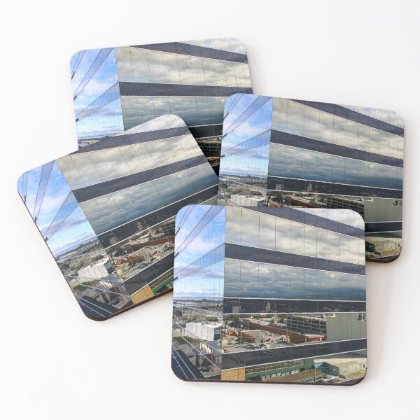 Item preview, A cloudy sky reflected on the corner of a glass high-rise building designed and sold by James-Cole.