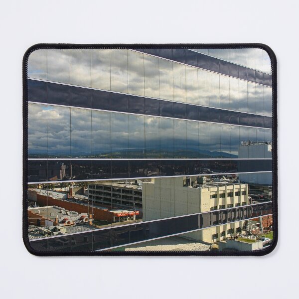 Item preview, A cloudy sky reflected on the glass windows of high-rise building designed and sold by James-Cole.