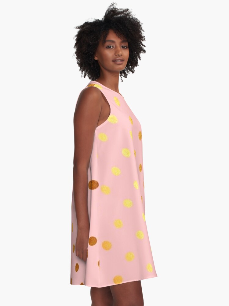 pink dress with gold polka dots