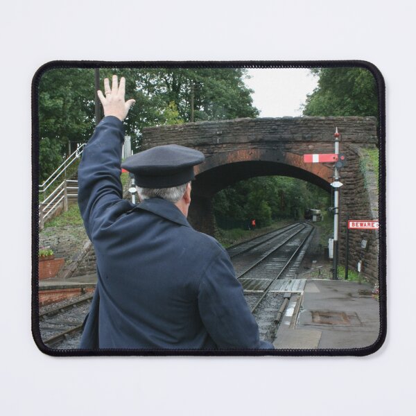 Item preview, Station master waving to an arriving train, Bishops Lydeard station, UK designed and sold by photoslot.