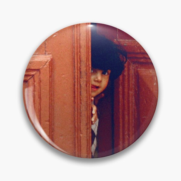 Item preview, Girl Peers through a Maltese Doorway in Valetta designed and sold by JonDelorme.