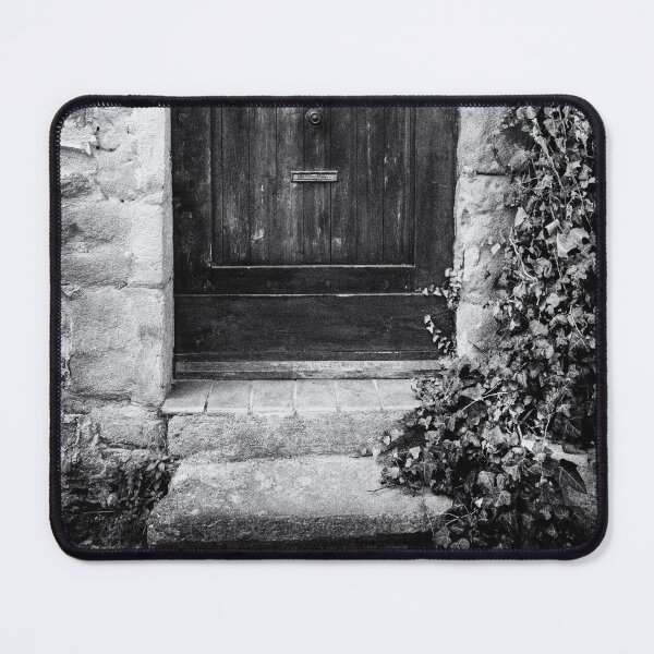 Item preview, Black and white photo of a secret mysterious old door overgrown with ivy in France designed and sold by Diana van Neck.